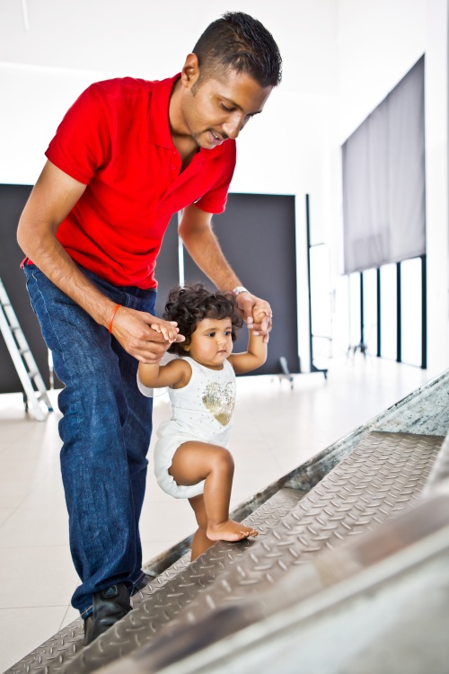 Daddy takes little Neha for a walk